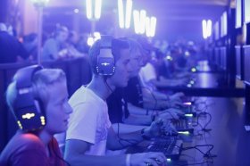 COLOGNE, GERMANY - AUGUST 16: Gaming enthusiasts play Starcraft at the Gamescom 2012 gaming trade fair on August 16, 2012 in Cologne, Germany. Gamescom is Europe's largest gaming expo with 600 international developers exhibiting their latest products. Around 250,000 visitors are expected to attend the four-day event being held between August 15-19. (Photo by Juergen Schwarz/Getty Images)